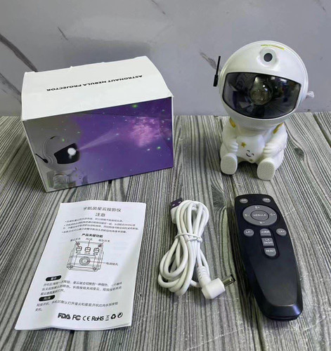 چراغ خواب کهکشانی آدم فضایی مدل نشسته ریموت دار Astronaut